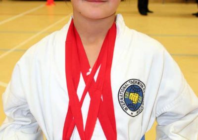 UKTD student Dunia proud with her 3 medals from the England Open 2012.